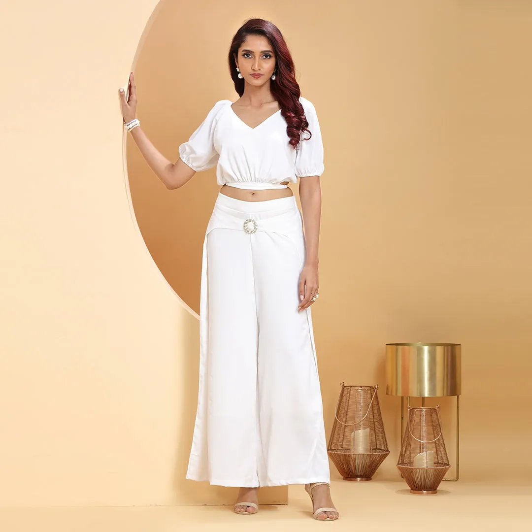 White co-ord set with diamond -studded buckle