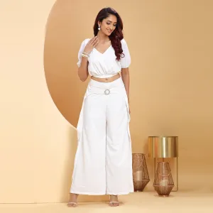 White co-ord set with diamond -studded buckle