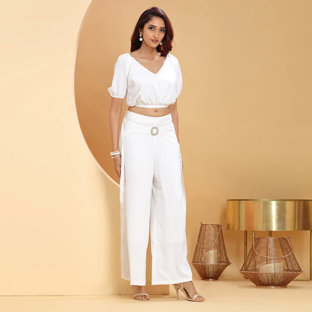 White co-ord set with diamond -studded buckle